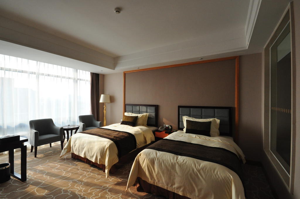 פושאן Nanhai Jiayi International Hotel חדר תמונה